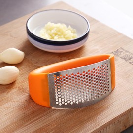 Garlic Press Crusher,Stainless Steel Garlic Press Rocker - Precision Kitchen Gadgets Garlic Chopper Garlic Mincer with Silicone Garlic Peeler,Egg Separator Filiter Tools For You (Orange)