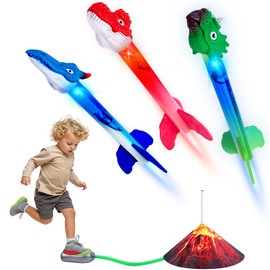HomeChi Lanzador de Dinosaurios para Niños, 3 Cohetes Luminosos de Espuma, Lanza hasta 100 Pies para Niños y Niñas 3 a 10 Años, Juguete Lanzador de Cohetes a Pedal para Halloween Navidad Cumpleaño