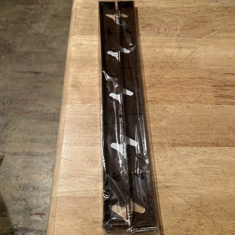THE CAP RACK BY HOLDS UP TO 10 CAPS, ATTACHES