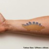 'Yellow Stegosaurus' Temporary Tattoo - Water Resistant, Skin-Safe, Non-Toxic Transfer