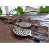 Large delicate mandala and blue crystal: cut-out, long hook earrings