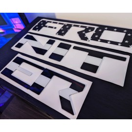 Advanced Trims Blackout Flag Raised Tailgate Letters 2022 - 25 Nissan Frontier Plastic Inserts