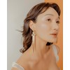arete de perlas de agua dulce con borla larga de