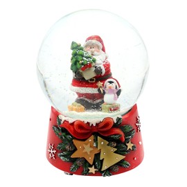 Dekohelden24 Snow globe Santa with penguin on Christmas base with musical mechanism, melody Feliz Navidad, L/W/H/Ø ball 10 x 10 x 15 cm, diameter 10 cm.