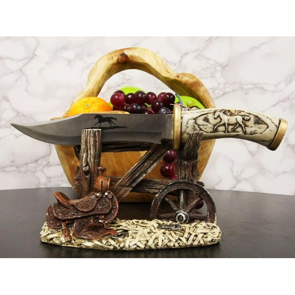 Western Horse Saddle By Wagon Wheel With Blunt Knife Display