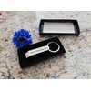 Keychain with bottle opener "TONI" with Engraving made of metal,