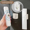 QEDBOJE 2 Pack Magnetic Hook Stand Remote Holder Wall Mount