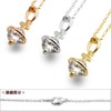 Pendant Necklace with Zirconia on Saturn Inspired Cross Silver Gold,