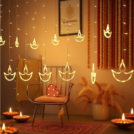 jiaozhen Diwali Diya Curtain Lights, 12 Hanging LED Diyas with Warm White Glow, Plug in String Lights with 8 Modes, Happy Diwali Festival Decoration for Indoor Outdoor Window Wall Home Party