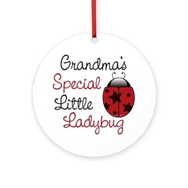 CafePress Grandma's Ladybug Round 4" MDF Holiday Ornament