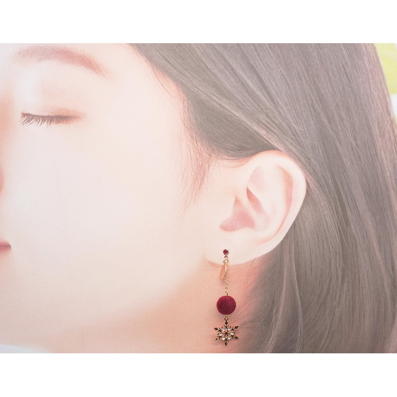 fur ball and snowflake earrings on chain