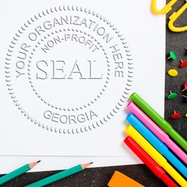 Georgia Handheld Non-Profit Seal Embosser, GA Not for Profit Seal, Georgia Organization Seal Embosser, Pocket Model, Chrome Frame, 1-5/8 Size, Seal for Corporation, Seal for Company