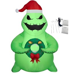 Christmas Inflatable Green Oogie Boogie Holding Monster Wreath 5 Foot Air-Blown Inflatable Blow Up - Comes with Tether Stakes, Rope, Power Supply and a Bonus Repair Patch