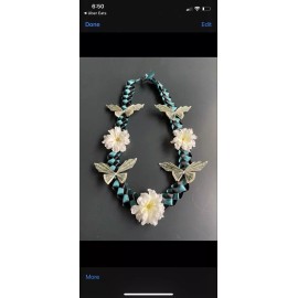 graduation money lei with white flowers