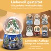 Snow globe Christmas music box, winter hut, base Christmas market