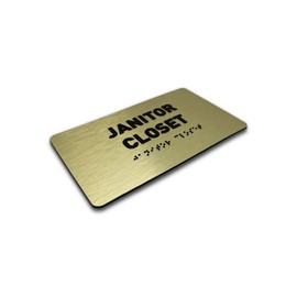 Janitor Closet Sign by GDS - ADA Compliant, Raised Icons, & Grade 2 Braille - With Adhesive Strips for Easy Installation - Signs for Offices, Businesses - 7" W x 4" H (Brushed Gold) - Made in USA