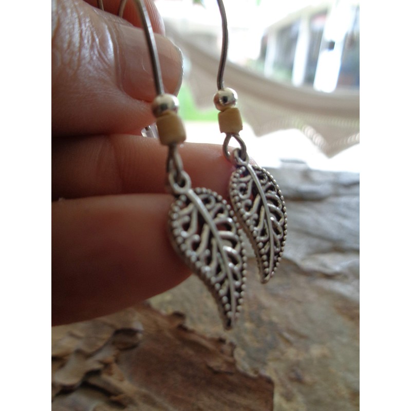 Small delicate decorated leaves: unique earrings with coconut earrings