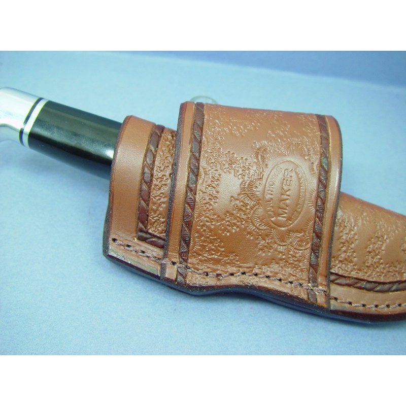 Cross draw knife sheath for the buck 103 knife.