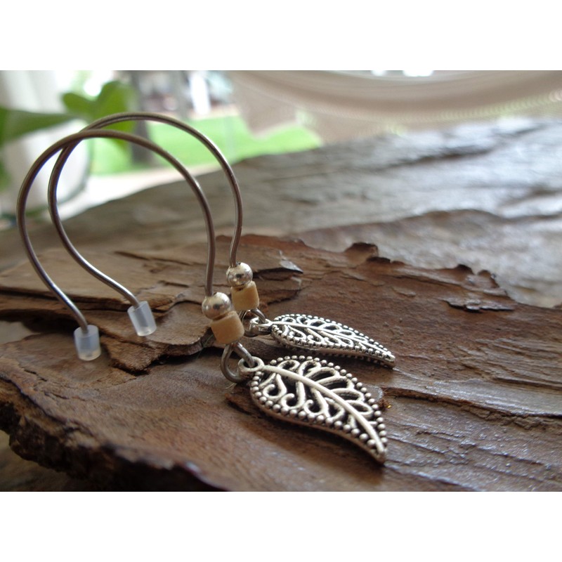 Small delicate decorated leaves: unique earrings with coconut earrings