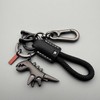 Aluminum Alloy Dinosaur Charm Paired with a Hand-woven Bracelet, Keychain