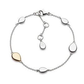Kit Heath - Coast Pebble Golden Station Bracelet A mix of Sterling Silver and gold tones, inspired by nature—wear as a statement or gift with a personal touch