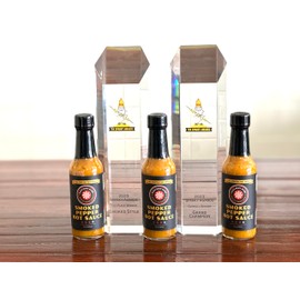 Paulman Acre: Smoked Pepper Hot Sauce (5floz) Apple Smoked Habaneros with Pineapple, Mango and Papaya
