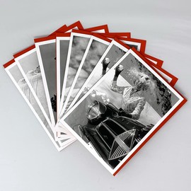 Pack of 8 Christmas cards featuring vintage black and white photos of festive winter scenes at Christmas, 2 each of 4 different designs, cards are 12.5 x 17.5cm and come with a red envelope