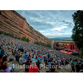 Photo- An audience takes in a rock concert at the Red Rocks Amphitheater, a naturally formed, world-famous outdoor venue fifteen miles west of Denver in the town of Morrison 20in x 16in