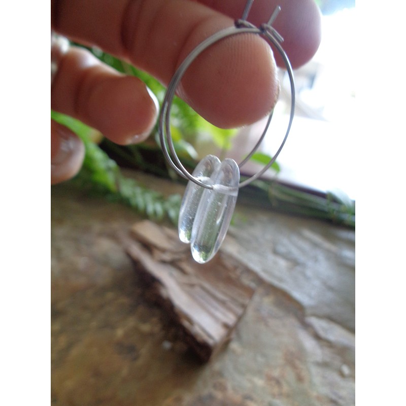 Rock crystal and silver stainless steel hoop earrings. Metal-coloured earrings