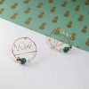 Cachito Studio Custom Word Earrings in 14k Gold w. Peacock
