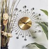 Deco 79 Metal Starburst Decorative for Home with Black Accents