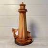 Handcrafted Wood-Effect Lighthouse: 22cm Height, Intricate Carving, Adorned with Whale