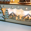 Christmas Wooden Scene 3D Model Illuminated Houses Fir and Snowfall