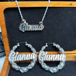 Custom Nameplate Jewelry Set | 2.5" Silver XOXO Hoop Earrings | Nameplate Necklace | Laser-Cut Silver Script Letters | Starry Glitter Background | Engravable Wood Gift Box | Crafted in CT, USA.