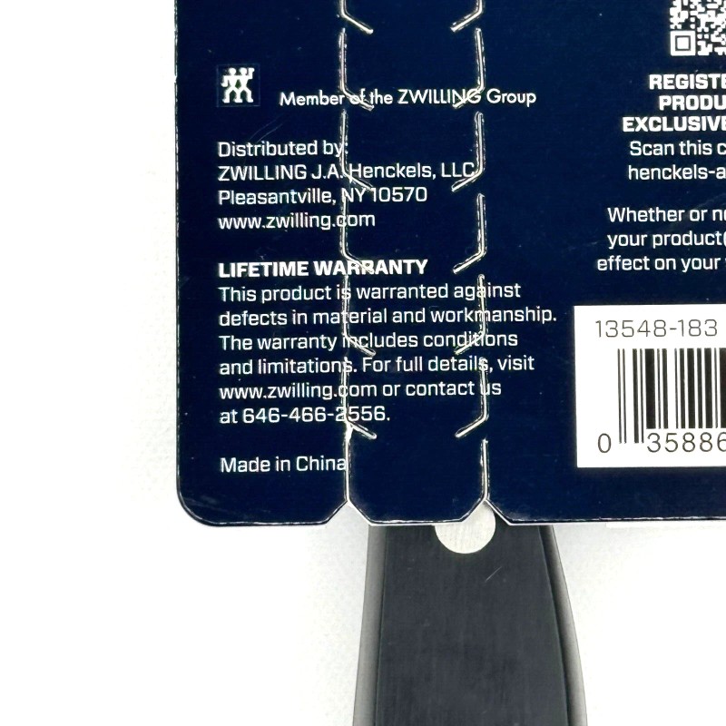 ZWILLING J.A. HENCKELS Henckels Statement 7” Hollow Edge Santoku Knife
