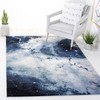 SAFAVIEH Galaxy Collection Accent Rug - 2'7" x 5', Blue
