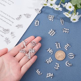UNICRAFTALE 26pcs Metal Letter Pendants Old English Gothic Pendants Stainless Steel A-Z Letter Charms with Jump Ring for Bracelets, Necklaces and Earrings Craft Making, 3mm Hole