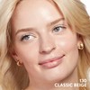 COVERGIRL Clean Invisible Foundation Makeup, Dewy & Glowy Natural Finish,