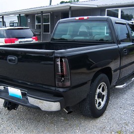 Spec-D Tuning Jet Black Housing Red LED Bar Tail Lights Compatible with 2003-2006 Chevy Silverado 1500/1500HD/2500/2500HD, 2004-2006 Chevy Silverado 3500, Left + Right Pair Assembly