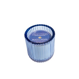 Field + Fleur by Hillhouse Naturals Beach Wood Blue Glass 8oz Scented Candle. with scents of Peach,Orange Blossom, Saffron,Moss, Amber & Sandalwood.100% Soy Wax Blend. Burn time 50+ Hours.