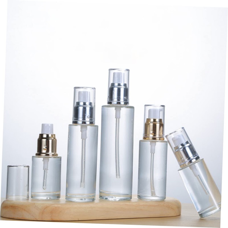 OHPHCALL 3pcs Portable Essential Oil Bottle Empty Pump Cosmetic Bottles