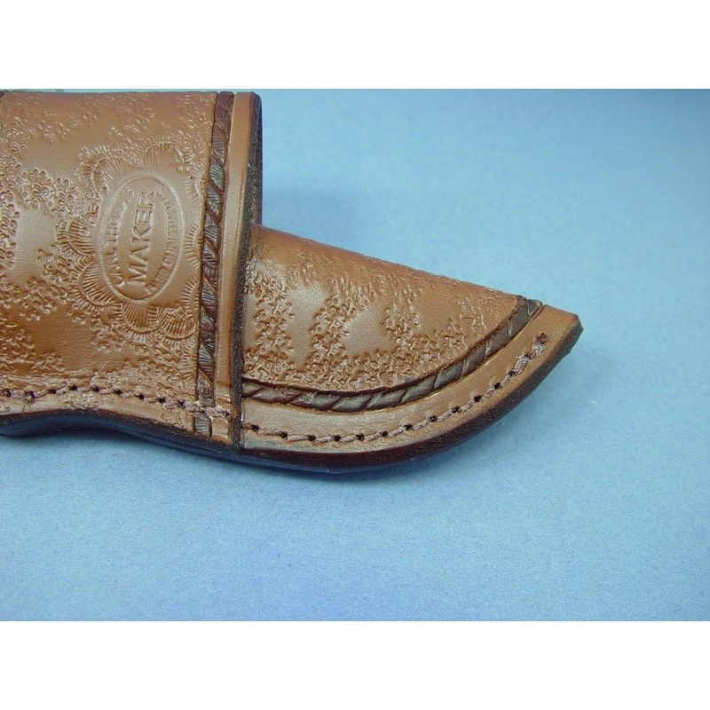 Cross draw knife sheath for the buck 103 knife.