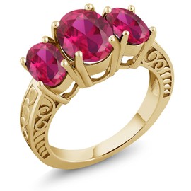 Gem Stone King 18K Yellow Gold Plated Silver Red Created Ruby 3-Stone Women Ring | 3.88 Cttw | Oval 9X7MM and 7X5MM | Available in size 5, 6, 7, 8, 9