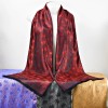 AeraVida Elegantly Stunning Hand Woven Red and Black Silk Elephant