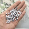 Amaney Letter Beads F 100pcs 7x4mm White Round Acrylic Black