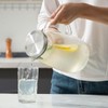 Purefold Glass Pitcher with Lid, 81oz Heat Resistant Water Jug