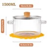 Clear Glass Cooking Pot With Lid And Brush On Stove