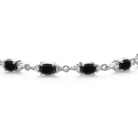Gem Stone King 925 Sterling Silver Black Onyx and White Moissanite Tennis Bracelet For Women (5.71 Cttw, Gemstone Birthstone, Oval 6X4MM, 7 Inch)