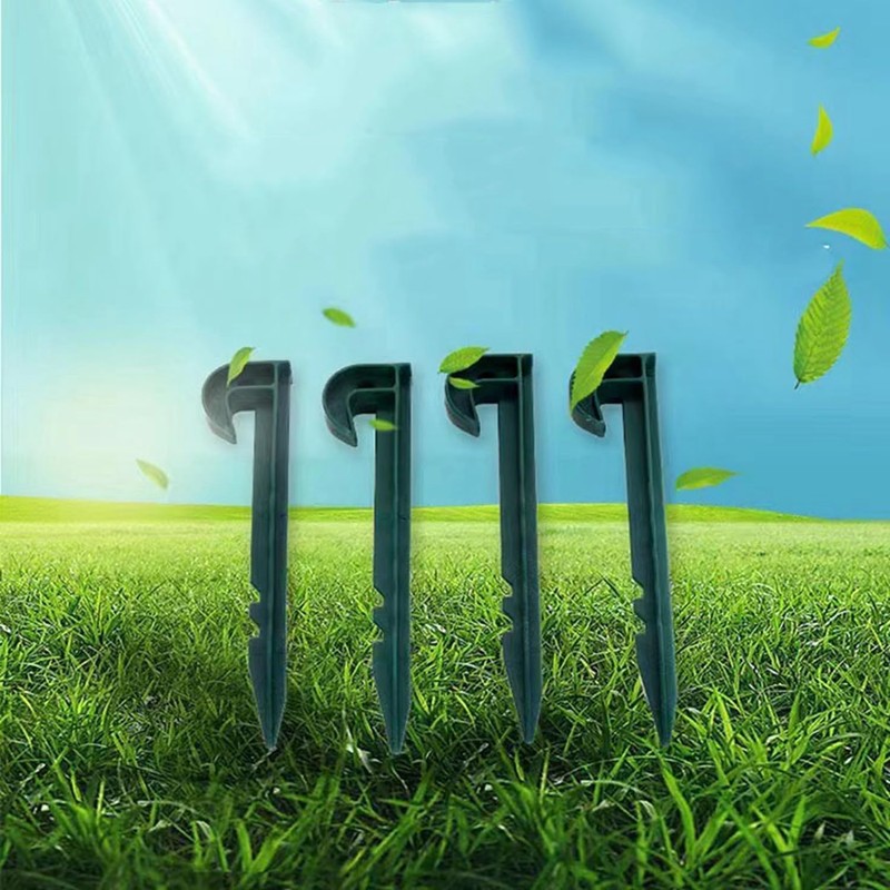 Eleutheromania Pack of 20 Plastic Tent Pegs (Green)