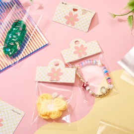 KISSITTY OPP Cellophane Bags 100pcs 2.3x3.9 Inches Small Jewelry Wedding Party Favor Storage Bags with Yellow Color Header Cards for Earring Hair Clips Small Presents Bracelets Packaging